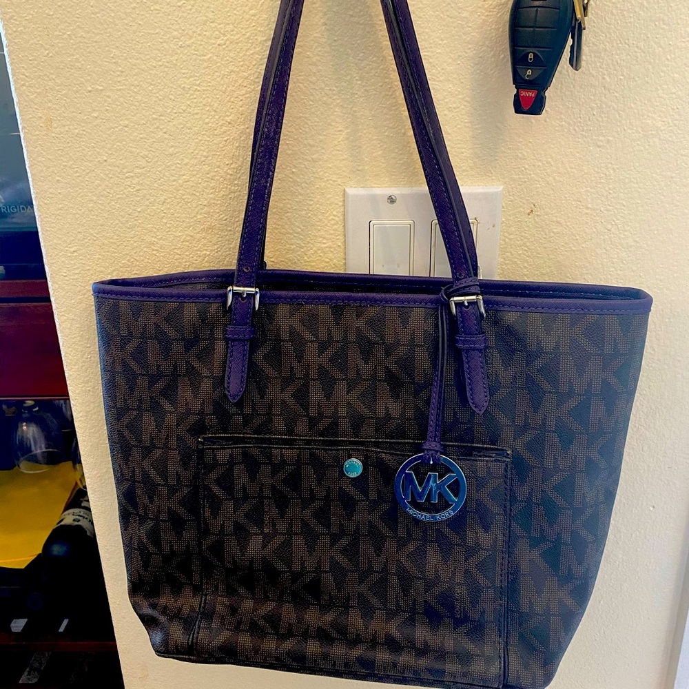 Brown Michael Kors-purple shoulder straps & trim.